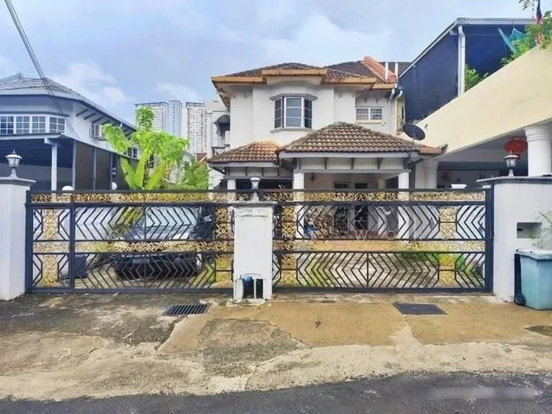 Exterior type: detached bungalow; features: two-storey house, tiled roof, white painted facade, decorative metal gate, manicured lawn, driveway with interlocking pavers, surrounded by greenery, front porch, balcony on upper floor, visible parking area; style: modern.