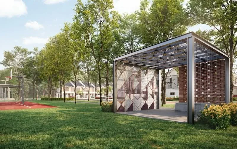 Exterior type: landscape garden; features: open pavilion with decorative wall, manicured lawn, mature trees, basketball court, red sports court, flower beds, pathway, surrounding residential buildings; style: modern.