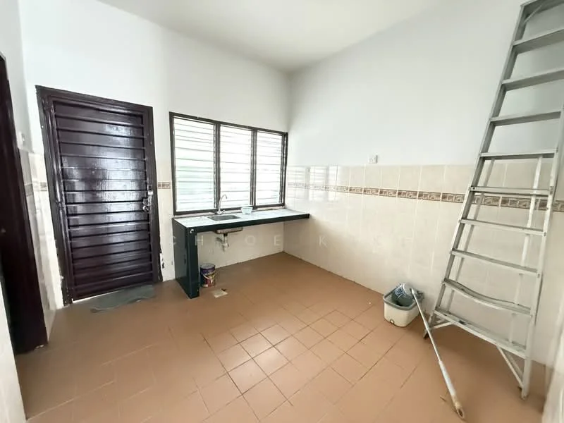 Laundry features: single-bowl stainless-steel sink, chrome pull-down faucet, wall-mounted cabinets, tile backsplash, cream tiled walls, brown tiled flooring, window with metal grille, ladder, plastic bucket, cleaning supplies container.