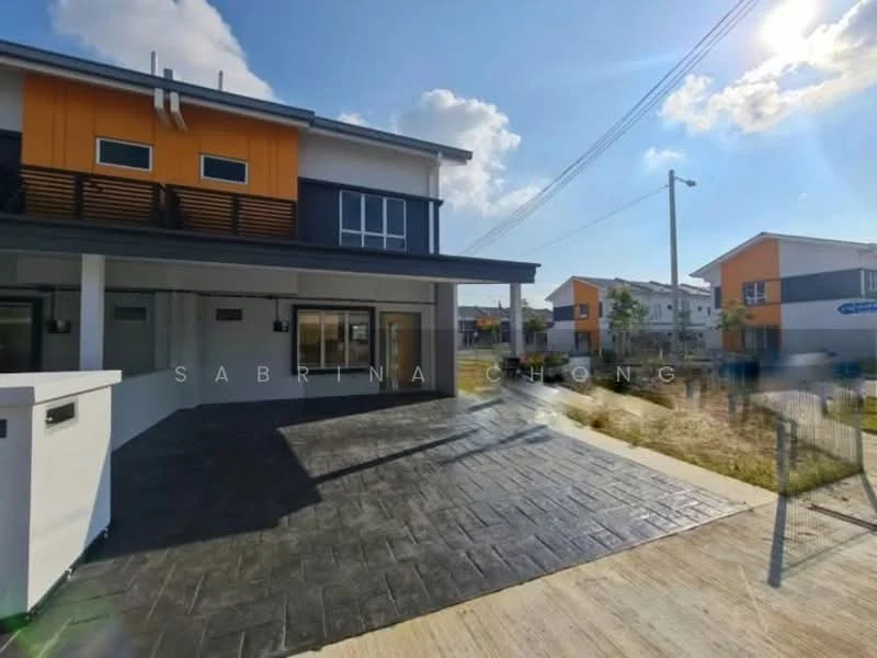 Exterior type: linked terrace house; features: two-storey building, grey painted facade, orange accent panels, slate-patterned driveway, large windows, front porch area, manicured lawn, surrounding greenery, paved walkway, street lighting, utility poles visible; style: modern.