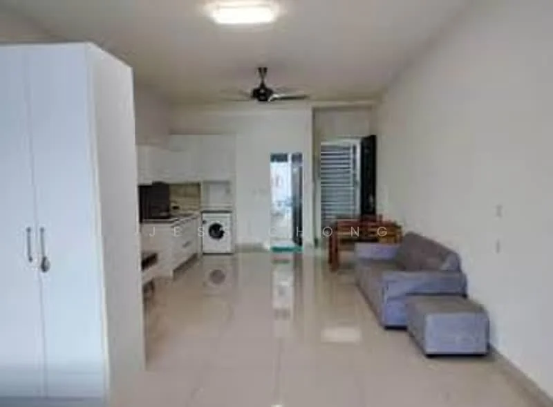 Living features: grey fabric sofa, coffee table, wall-mounted TV, white cabinetry, built-in washing machine, kitchenette with white cabinets, stainless-steel sink, 4-burner gas hob, refrigerator, ceiling fan, tile flooring, neutral wall color, large window, open layout; style: modern.