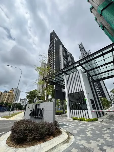 Exterior type: high-rise condominium; features: glass curtain wall, black and white facade, recessed balconies, landscaped entrance, manicured shrubs, paved walkway, modern architectural design, surrounded by urban landscape; style: modern.