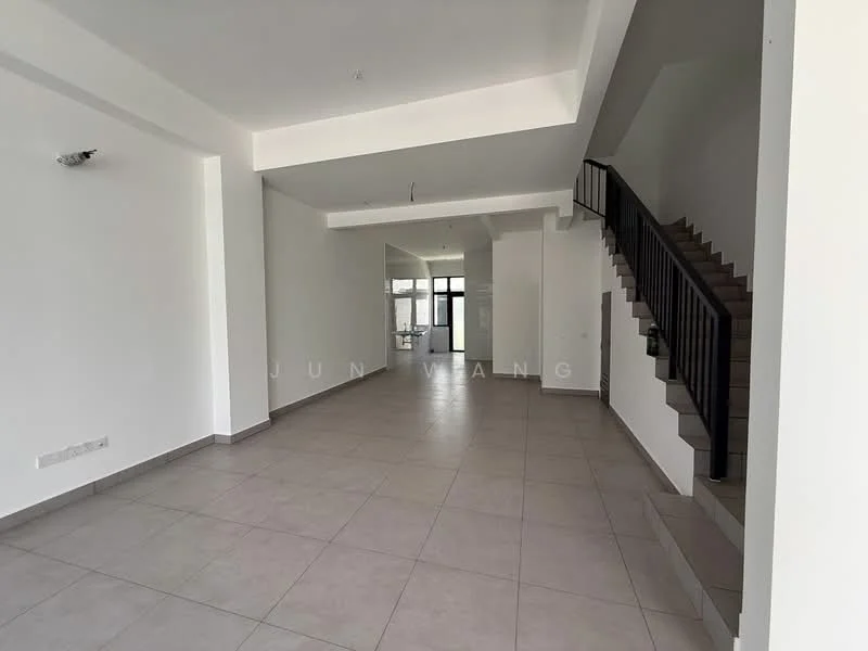 Room features: white painted walls, grey tiled flooring, exposed ceiling with recessed lighting, staircase with black railing, large windows allowing natural light, open layout, no visible furniture or decor; style: modern.