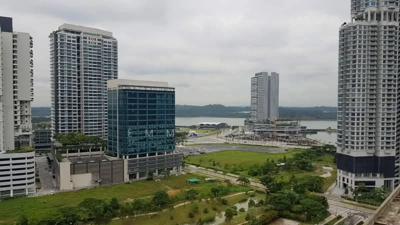 Exterior type: high-rise condominium; features: glass curtain wall facade, surrounded by landscaped greenery, waterfront view, multiple high-rise buildings, open parking area, manicured lawn, urban context with nearby amenities; style: modern.