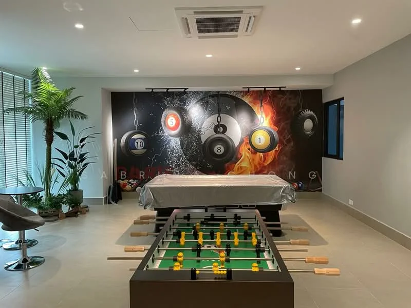 Room features: pool table, foosball table, green felt on foosball table, decorative wall with billiard balls, potted palm plant, large windows with blinds, recessed ceiling lights, air conditioning unit, grey tiled flooring, modern bar stools, round dining table, wall-mounted artwork; style: modern.