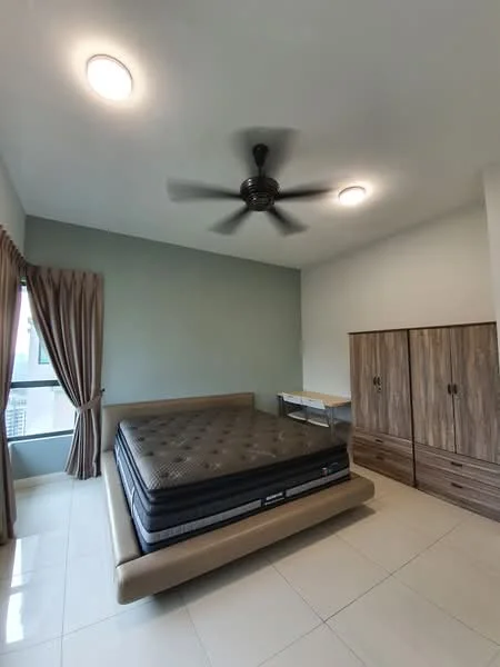 Bedroom features: king-size bed, upholstered bed frame, mattress on bed, 2 ceiling lights, 5-blade ceiling fan, curtains in beige, light green painted walls, glossy tile flooring, wooden wardrobe with multiple doors, study desk, wall-mounted power outlet; style: modern; view: city.