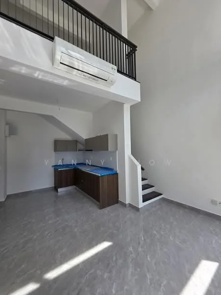 Room features: grey marble tile flooring, white painted walls, exposed ceiling with beams, 1 wall-mounted split AC, staircase with wooden steps, kitchenette with brown cabinetry, blue countertop, open layout; style: modern.