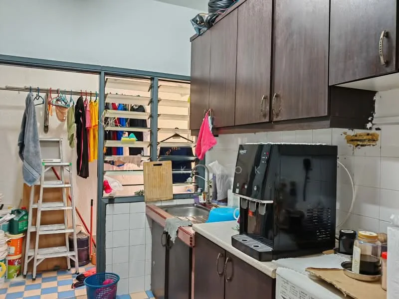 Kitchen features: dark wood cabinetry, white tiled backsplash, laminate countertop, single-bowl stainless-steel sink, chrome pull-down faucet, built-in coffee machine, stainless-steel appliances, checkerboard tile flooring in blue and orange, open shelving, laundry area visible, clothes hanging on rack, ladder in corner; style: modern.