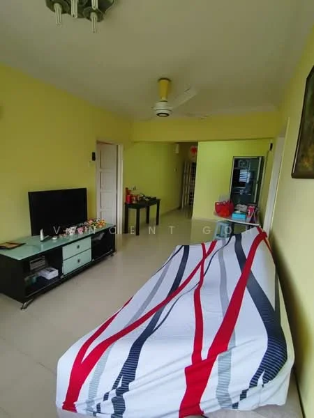 Living features: yellow painted walls, ceramic tile flooring, 5-blade ceiling fan with light, wall-mounted TV, TV console in black and mint green, sofa with striped red and white cover, coffee table, decorative wall art, open doorway leading to another room.