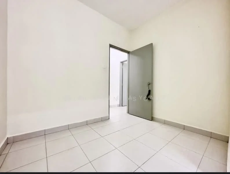 Room features: white painted walls, tile flooring, single door, light switch, neutral color scheme, corner room, no visible furniture, natural light from door opening; style: minimalist.