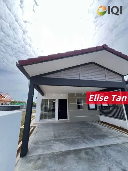 Exterior type: detached bungalow; features: grey painted facade, red pitched tile roof, front porch with concrete flooring, single main entrance door, horizontal siding, surrounding fencing, manicured lawn, driveway, cloudy sky backdrop; style: modern.