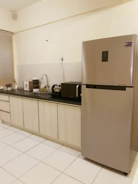 Kitchen features: light wood cabinetry, black countertop, stainless-steel fridge, microwave, kettle, sink, chrome faucet, white tiled flooring, white painted walls; style: modern.