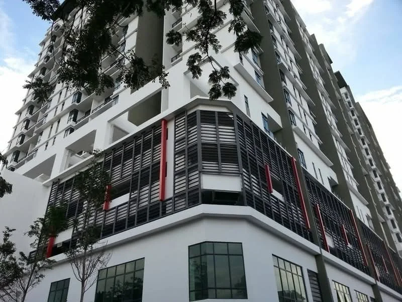 Exterior type: mid-rise condominium; features: white painted facade, grey accent walls, glass windows, horizontal louvre screens, red vertical accents, manicured landscaping, surrounded by trees, multiple storeys, modern architectural design; style: modern.