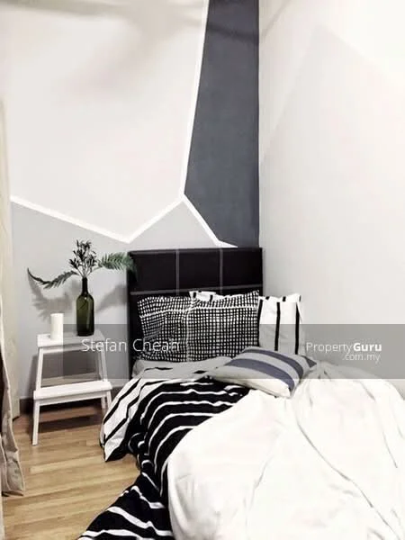 Bedroom features: wooden flooring, white painted walls, grey accent wall, black headboard, decorative pillows, striped bedding, white bedspread, nightstand, decorative vase with greenery, candle, textured throw pillows, black and white tote bag; style: modern.