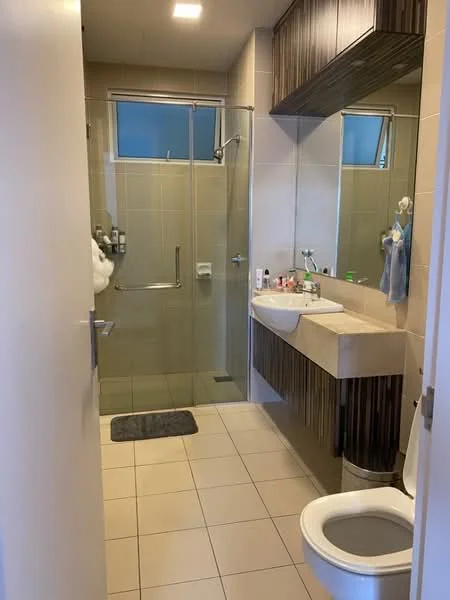 Bathroom features: walk-in shower with glass enclosure, chrome handheld shower, single-sink vanity with stone countertop, framed mirror, one-piece toilet, tile flooring, light-colored wall tiles, wood cabinetry, towel rack, bath mat; style: modern.