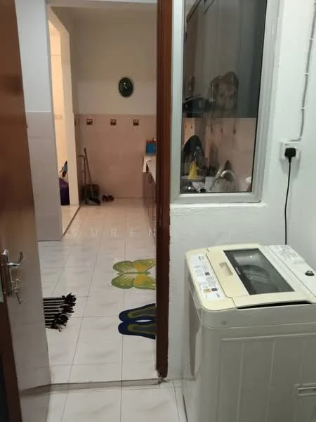 Laundry features: front-load washing machine, white tiled flooring, white walls, window for natural light, laundry area with utility sink, decorative floor mat with floral pattern. Room features: white walls, white tiled flooring, doorway leading to another room, light fixture on ceiling.