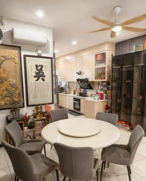 Dining features: round dining table, 6 upholstered dining chairs in grey, white marble tabletop, ceiling fan, wall-mounted air conditioning unit, framed artwork on wall, decorative plants, built-in cabinetry with glass doors, kitchen area visible in background, light-colored cabinetry, stainless-steel oven, countertop with kitchen appliances; style: modern.