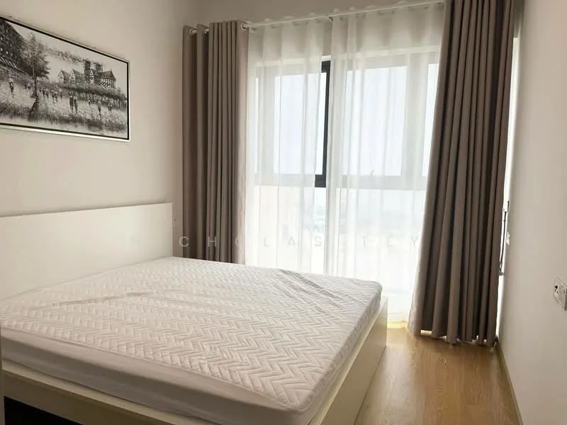 Bedroom features: queen-size bed frame without mattress, white painted walls, light wood flooring, floor-to-ceiling window, sheer curtains, dark grey curtains, minimalist decor, built-in wardrobe; style: modern; view: city.