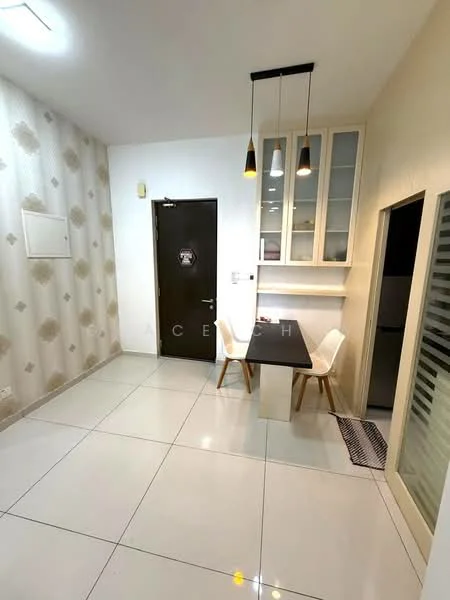 Dining features: white painted walls, cream accent wall with geometric pattern, glossy white tile flooring, dining table with black surface, two white dining chairs, built-in cabinetry with glass-front upper cabinets, three pendant lights above the table, door with dark wood finish, small mat at entrance; style: modern.