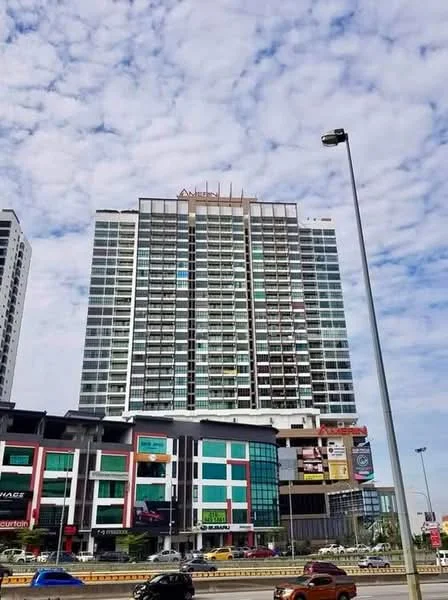 Exterior type: high-rise condominium; features: glass curtain wall, projecting balconies, multiple storeys, commercial units at ground level, signage on facade, surrounded by urban landscape; style: modern.