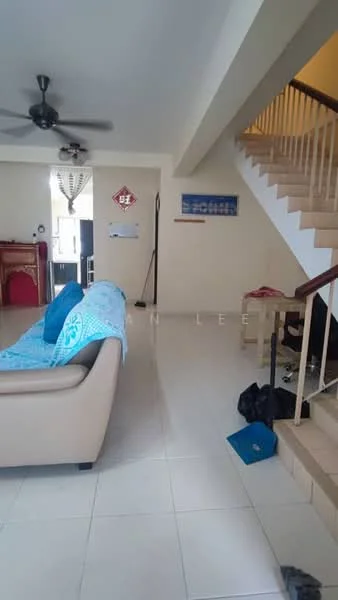Living features: 3-seater leather sofa in beige, ceiling fan, white walls, tile flooring, staircase with wooden railing, decorative wall art, area rug, floor lamp, open layout to adjacent room; style: modern.