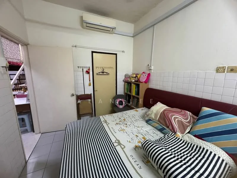 Bedroom features: queen-size bed with patterned bedding, upholstered headboard, wall-mounted air conditioning unit, white tiled flooring, white painted walls, built-in wardrobe with sliding doors, decorative pillows, small wall-mounted shelf, framed artwork, window with sheer curtains; style: minimalist.