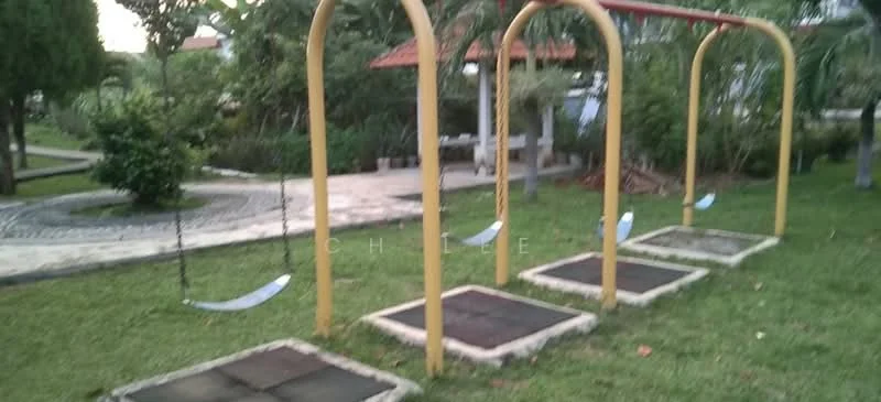 Exterior type: landscape garden; features: playground with swings, grass lawn, paved walkway, surrounding trees, outdoor seating area, landscaped garden; style: modern.