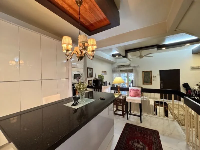 Kitchen features: white glossy cabinetry, black granite countertop, pendant lighting with three lamps, recessed ceiling lights, open layout to living area, marble tile flooring, ceiling fan, decorative wooden ceiling beam, kitchen island with seating, wall-mounted air conditioning unit; style: modern. Living features: sofa, armchair, side table, decorative lamp, window with sheer curtains, wall-mounted artwork, area rug; style: modern.