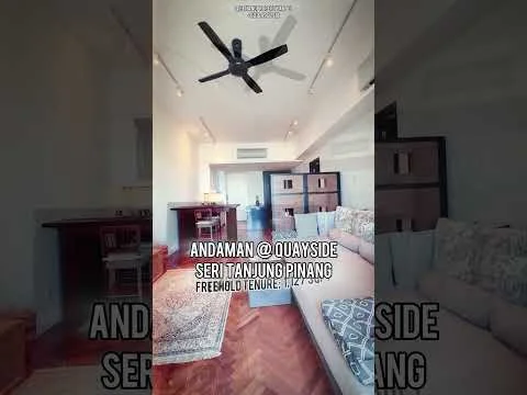 Living features: 5-blade ceiling fan, sofa in light beige fabric, wooden coffee table, wooden side table, area rug with geometric pattern, wall-mounted TV, built-in shelving unit, large window with natural light, wooden flooring, decorative wall art; style: modern.