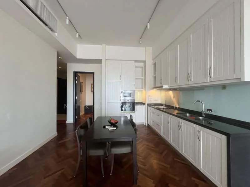 Kitchen features: white shaker cabinets, black countertop, built-in oven, stainless-steel sink, chrome pull-down faucet, ceramic tile backsplash, parquet wood flooring, recessed downlights, dining table with chairs, open shelving; style: modern.