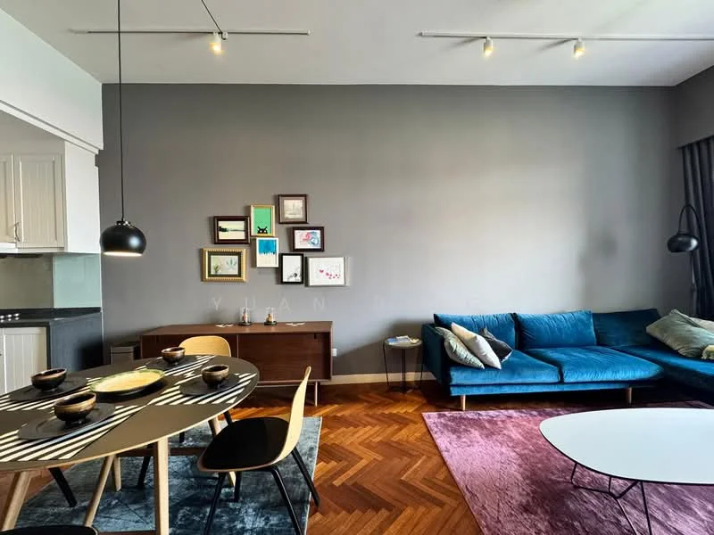 Living features: blue fabric sofa, coffee table, area rug with geometric pattern, wooden dining table, black dining chairs, decorative wall art, dark grey accent wall, chevron patterned wooden flooring, track lighting, pendant light, floor lamp, sideboard, decorative objects on sideboard; style: modern.