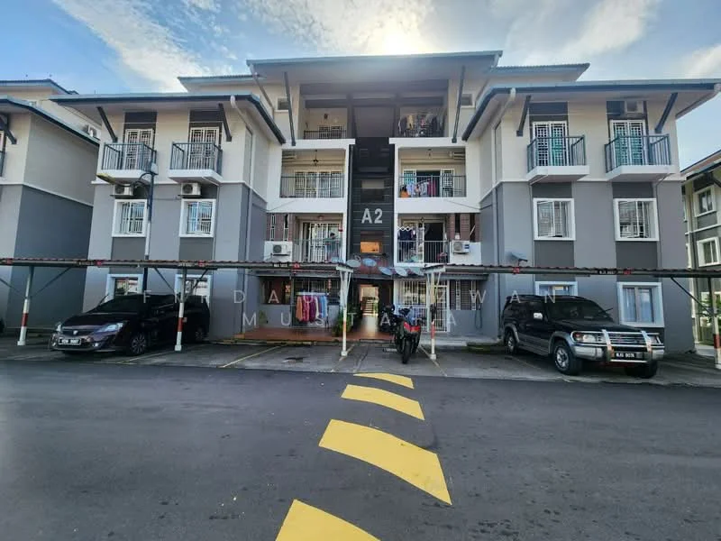 Exterior type: low-rise apartment block; features: 2-storey building, balconies with railings, car parking area, covered parking spaces, multiple air conditioning units, grey painted facade, black entrance door, striped yellow parking markings; style: modern.