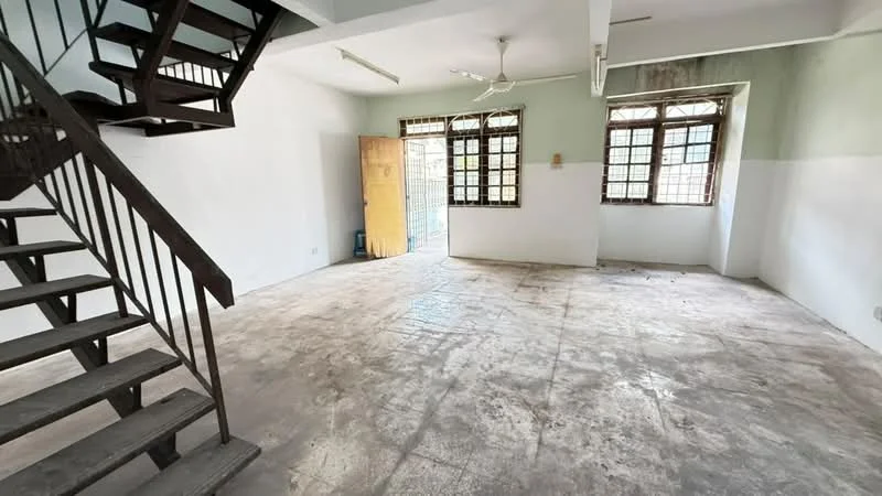Room features: concrete flooring, white painted walls, exposed ceiling, staircase with metal railing, large windows, natural light, open layout, no visible furniture; style: minimalist.