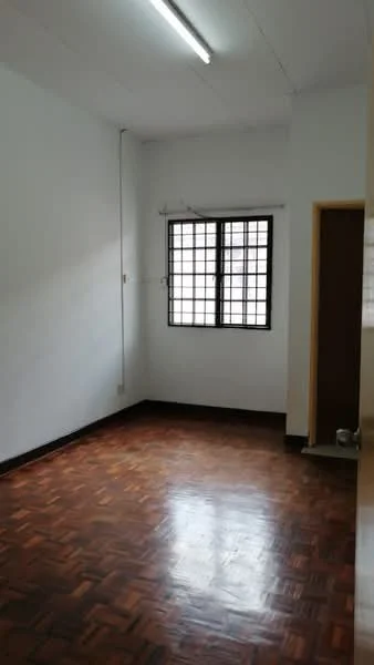 Room features: wooden flooring, white painted walls, single window with grid pattern, ceiling light fixture, doorway leading to another room; style: minimalist.
