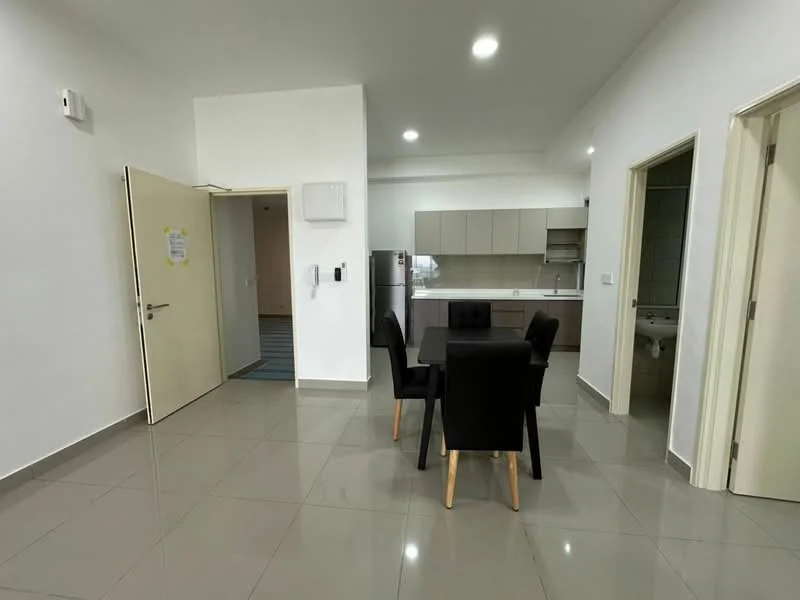 Dining features: 4-seater dining table, black upholstered dining chairs, grey tiled flooring, white painted walls, recessed LED downlights, open layout, kitchen area visible in background, doorway leading to hallway, doorway leading to bathroom, wall-mounted intercom, air conditioning unit; style: modern. Kitchen features: kitchen cabinetry in light grey, white countertop, stainless-steel sink, built-in oven, ceramic tile backsplash, open shelving, recessed LED downlights; style: modern. Room features: white painted walls, grey tiled flooring, doorway leading to hallway, doorway leading to bathroom.