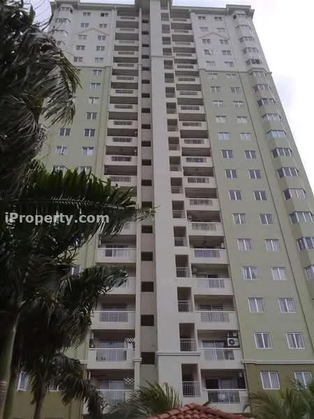 Exterior type: high-rise condominium; features: green painted facade, balconies with railings, multiple floors visible, air conditioning units visible, large windows, tropical landscaping in foreground, palm trees in front, flat roof; style: modern.
