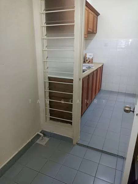Kitchen features: wood cabinetry, white tiled backsplash, blue ceramic tile flooring, single-bowl stainless-steel sink, countertop, window with security bars, wall-mounted cabinets, kitchen countertop, light-colored walls.