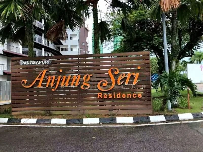 Exterior features: wooden signage with orange lettering, landscaped greenery, palm trees, paved driveway, curved road, modern architectural elements in background; style: modern.