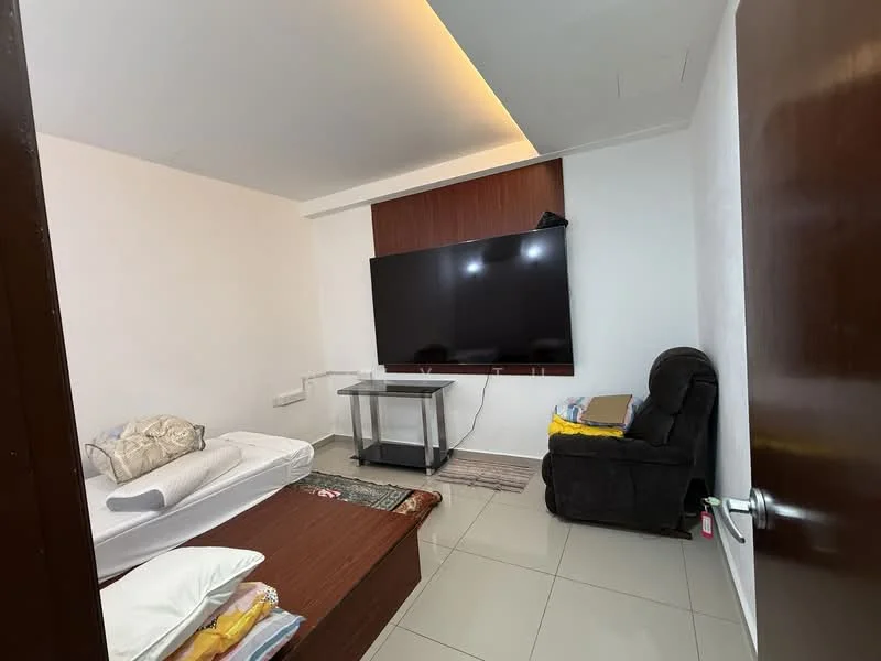 Living features: white painted walls, glossy tile flooring, recessed ceiling lights, large flat-screen TV on wall, wooden TV console, single armchair in dark fabric, bed with bedding visible, wooden platform bed frame, area rug, decorative throw pillows; style: modern.