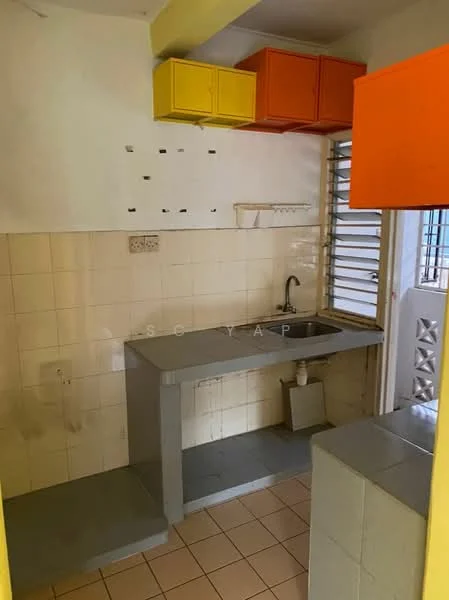 Kitchen features: grey countertop, single-bowl stainless-steel sink, chrome pull-down faucet, orange upper cabinets, yellow upper cabinets, white tiled walls, white tiled flooring, window with security bars, open shelving, wall-mounted dish rack.
