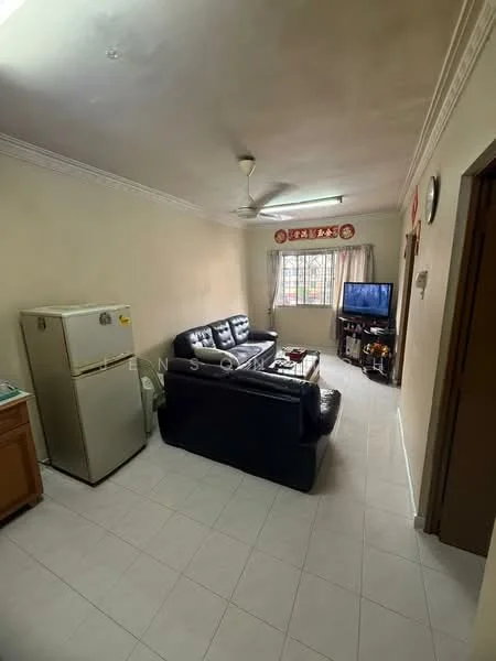 Living features: black leather sofa, 3-seater sofa, coffee table, TV console, wall-mounted TV, white tiled flooring, cream painted walls, ceiling fan, window with sheer curtains, refrigerator, wooden cabinet.