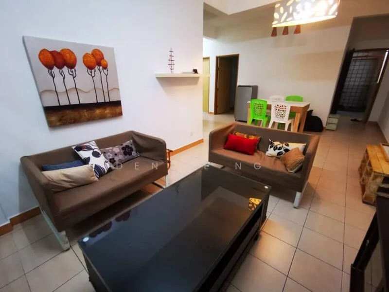 Living features: 2-seater fabric sofa in brown, 3-seater fabric sofa in beige, coffee table with glass top, framed artwork with orange trees, tile flooring, white painted walls, recessed ceiling lights, decorative pendant light, area rug with geometric pattern, cushions in various colors; style: modern. Dining features: dining table with wooden top, 4 plastic dining chairs in green and white, tile flooring; style: modern.