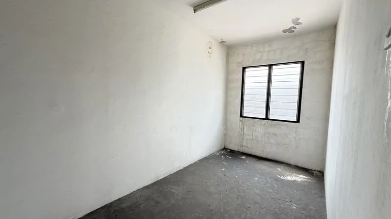Room features: white painted walls, concrete flooring, single window, no visible ceiling fixtures.