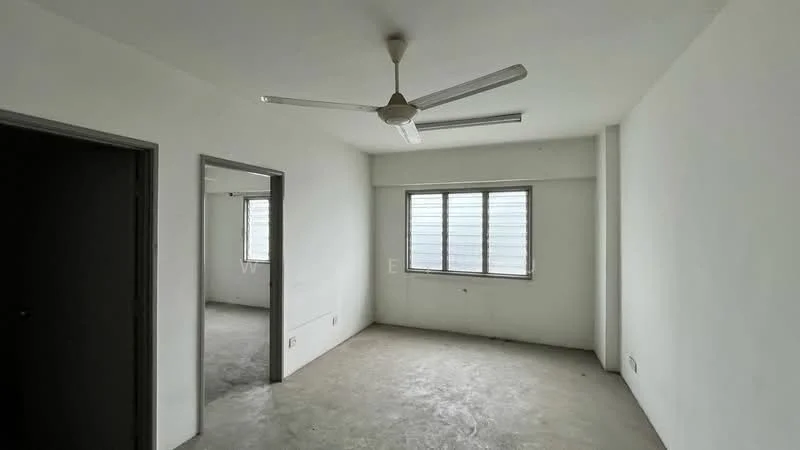 Room features: white painted walls, concrete flooring, 5-blade ceiling fan, window with horizontal slats, doorway leading to another room, natural light from window; style: minimalist.
