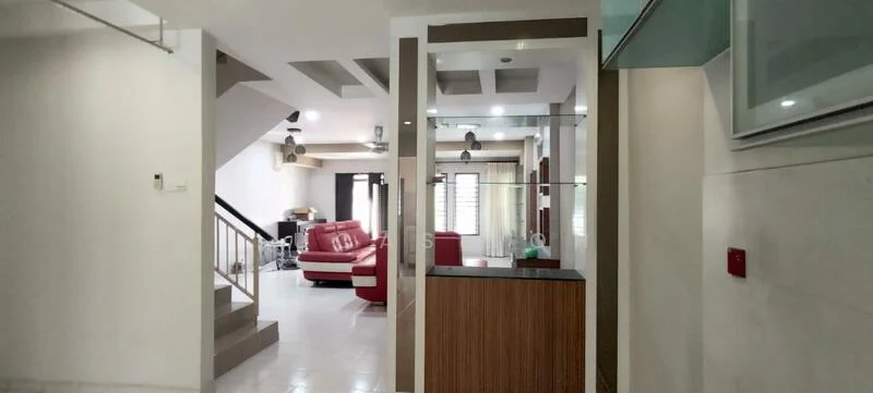 Living features: red leather sectional sofa, coffee table, wall-mounted TV, recessed downlights, white painted walls, tile flooring, open layout to dining area, large windows with sheer curtains; style: modern. Room features: staircase with wooden railing, white painted walls, tile flooring, ceiling with recessed lighting, glass partition.