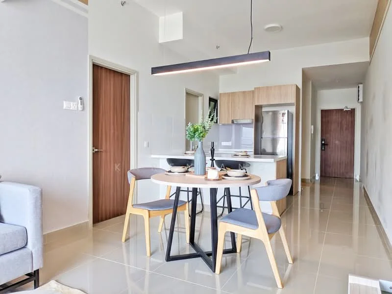 Dining features: round dining table, 4 wooden dining chairs, pendant light fixture, grey walls, glossy tile flooring, kitchen island with seating, stainless-steel fridge, built-in cabinetry, decorative plant on table, table setting with plates and cutlery; style: modern. Room features: open layout, doorway leading to hallway, light-colored cabinetry, neutral color palette.