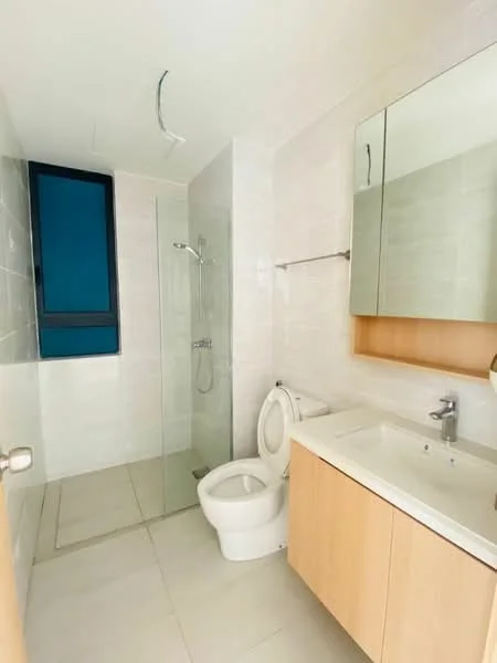 Bathroom features: white tiled walls, light grey tiled flooring, glass shower enclosure, rain shower head, handheld shower, single-sink vanity with wood cabinet, chrome basin mixer, framed mirror, one-piece toilet, window with blue frame; style: modern.
