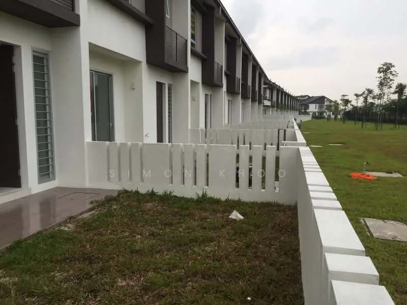 Exterior type: linked terrace house; features: white painted facade, two-storey structure, front garden area with grass, concrete fencing, sliding glass doors, horizontal louvre windows, paved walkway, manicured lawn, surrounding greenery; style: modern.