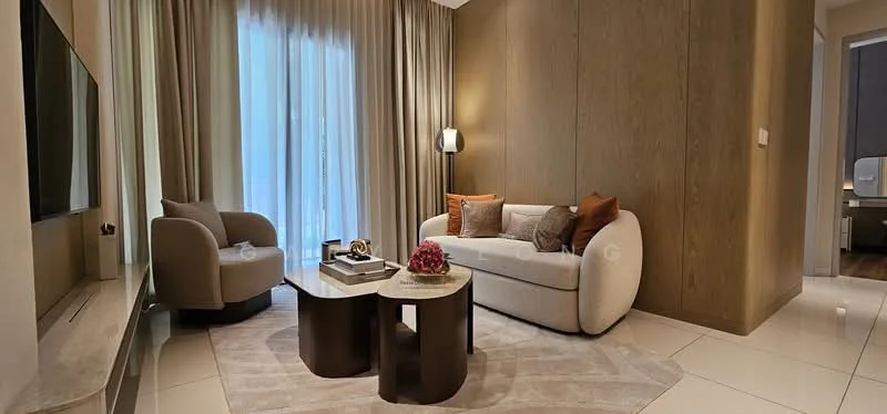 Living features: 3-seater fabric sofa in white, accent pillows in brown and beige, round armchair in beige, coffee table with curved design, area rug in light color, wall-mounted TV, floor lamp, curtains in light fabric, wood panel accent wall, white tiled flooring, decorative vase on coffee table, decorative book on coffee table; style: modern.