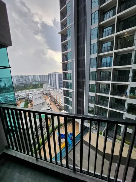Room features: glass balcony railing, black wooden balcony floor, city skyline view, high-rise buildings in the background, cloudy sky, outdoor space; style: modern; view: city.